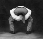 A photo of a guy who has managed to wedge his head up his ass