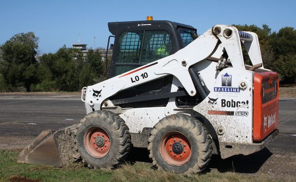A Bobcat front-end loader. We used to write similar articles for a client who made attachments for these things.